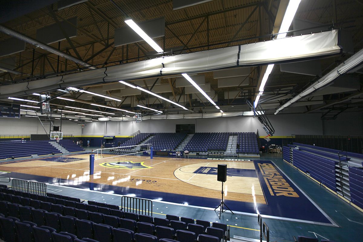 Free-standing bleachers with EXCEL Seat Modules and VISION Platform Chairs at the Spring Arbor University fieldhouse.