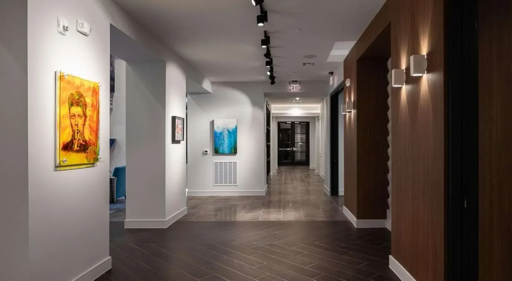 Interior hallway with art and lighting