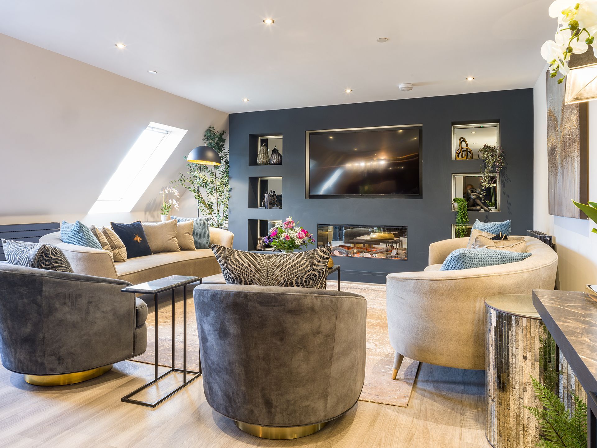 A living room filled with furniture and a flat screen tv.