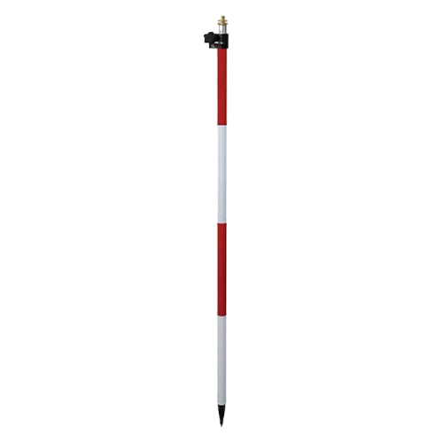 Red-and-white survey pole with a black tip and small device mounted on top on a white background