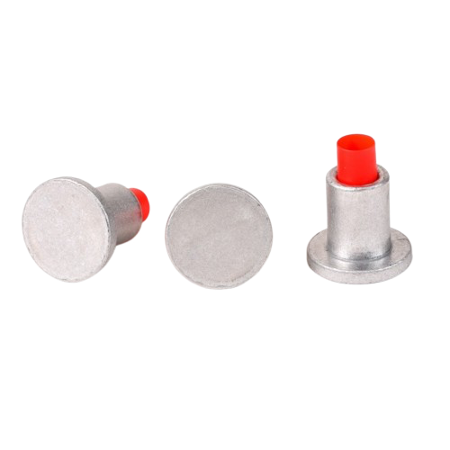 Silver metal button fasteners with red plastic pins on a white background