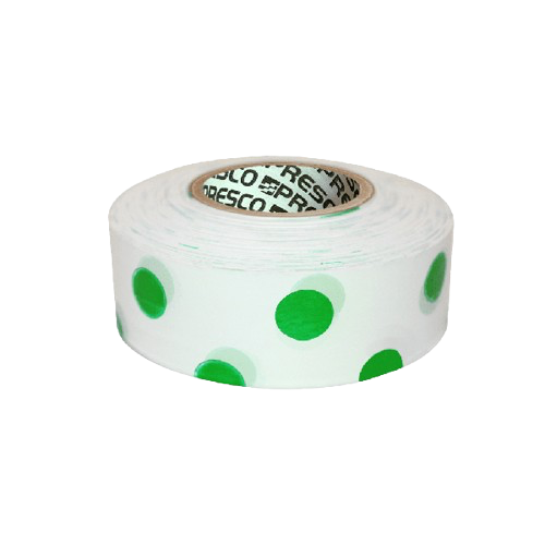 Roll of white stickers with large green polka dots