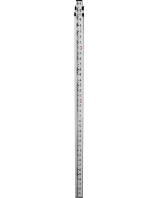 Tall white measuring ruler with black markings and a red center line against a plain background