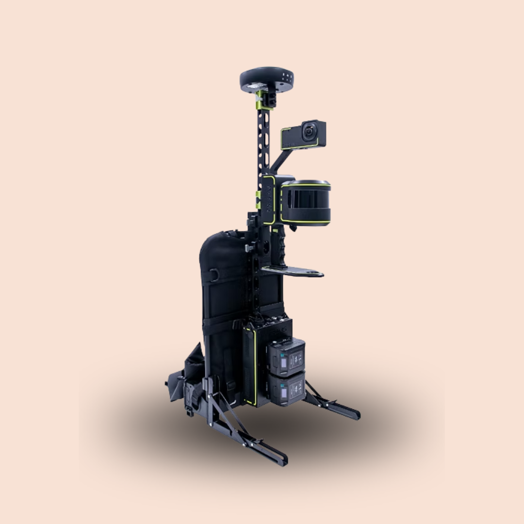 Black freestanding sensor tower with mounted cameras and devices on a beige background