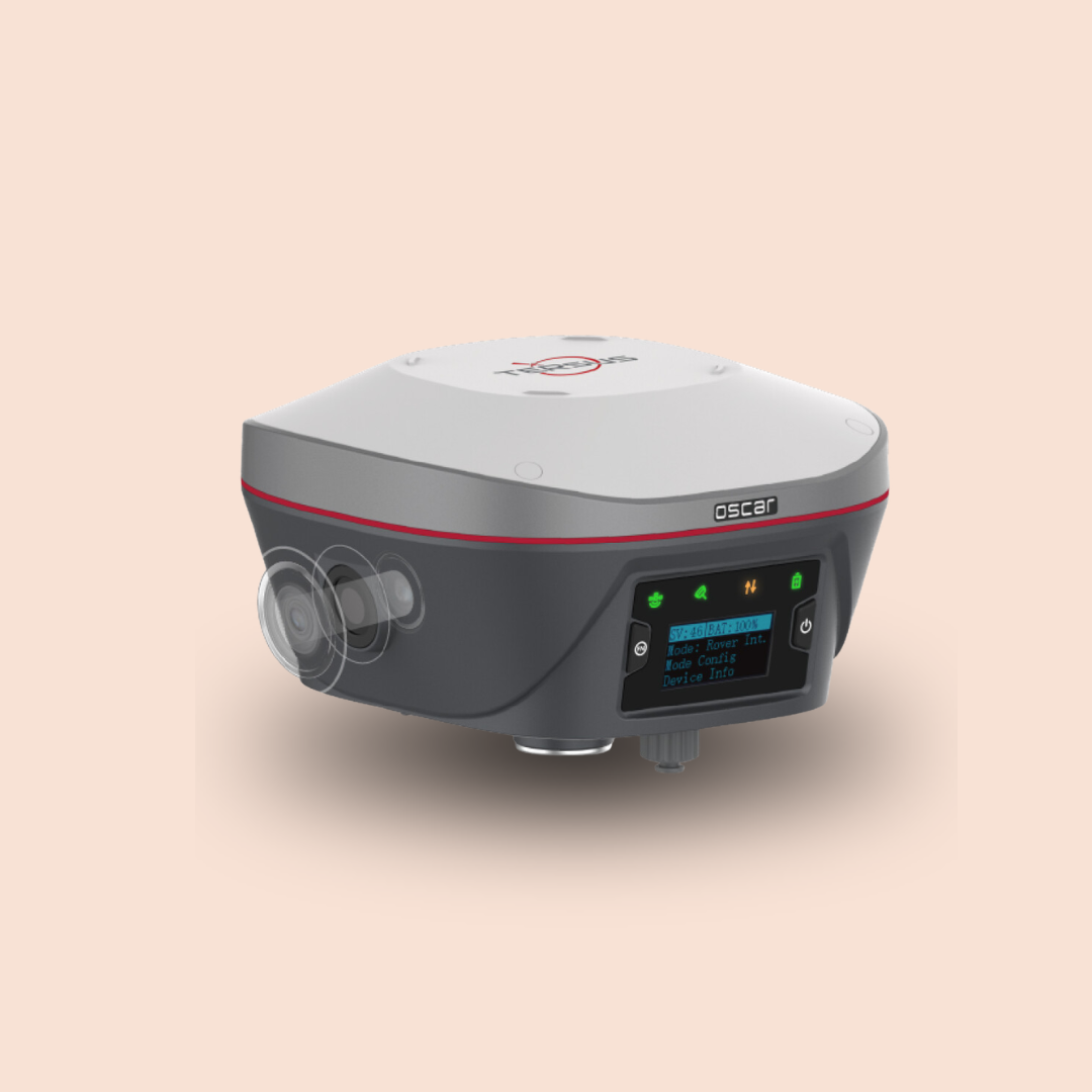 Gray and black medical device with a digital display and side ports on a pale background