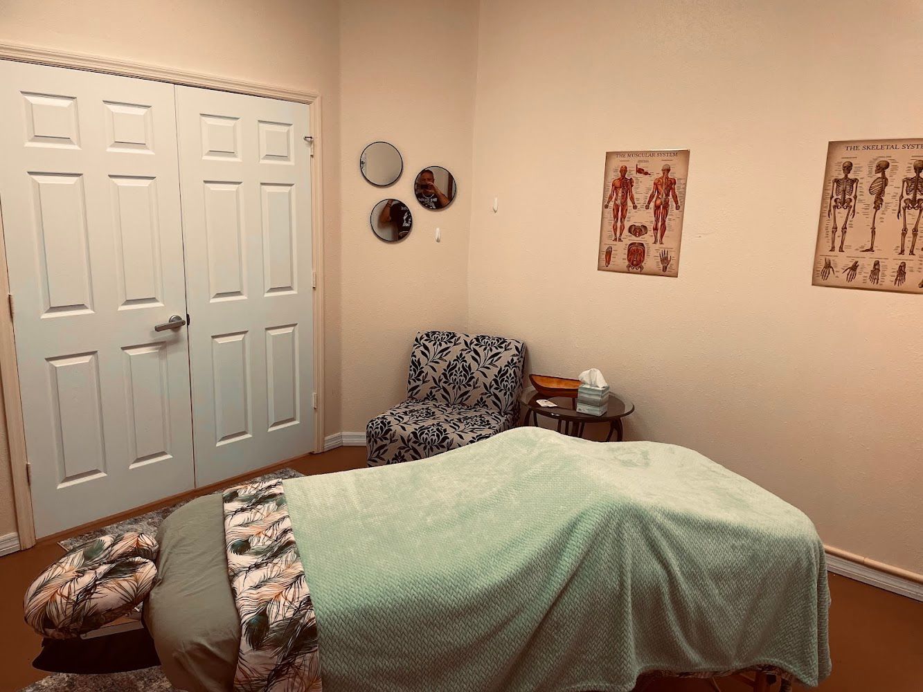 A massage table set up in the treatment room.
