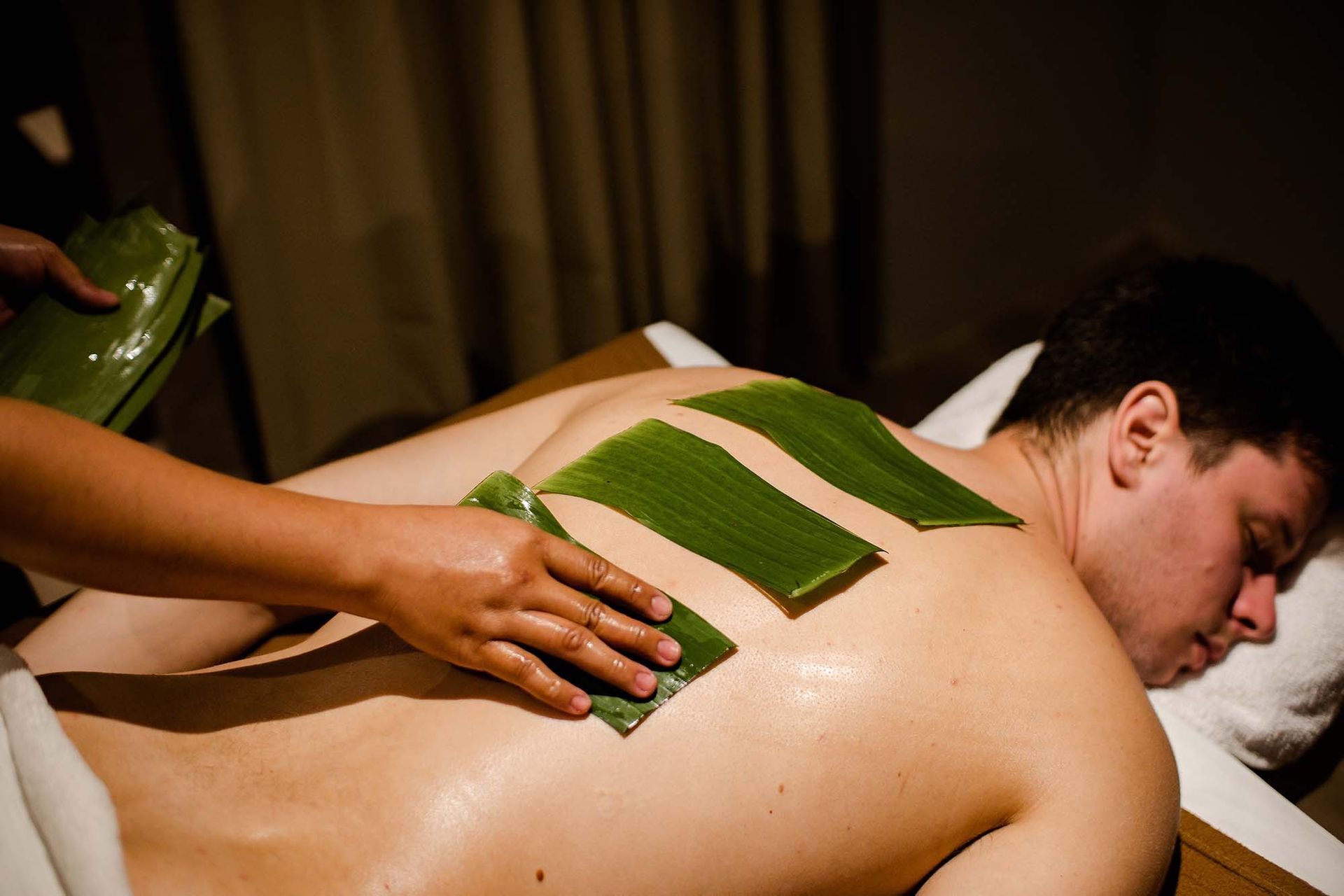 A man pampering in Charlie's Spa and Wellness Facility