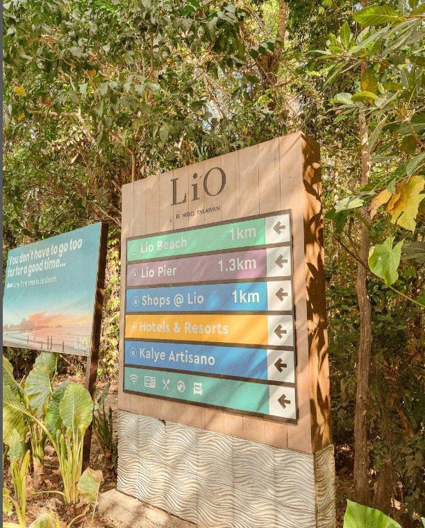 Lio El Nido Palawan directional sign to beach, pier, shops, resorts 1km