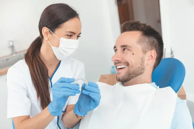 A Dentist And His Patient Smiling | Ogden, UT | Pleasant Valley
