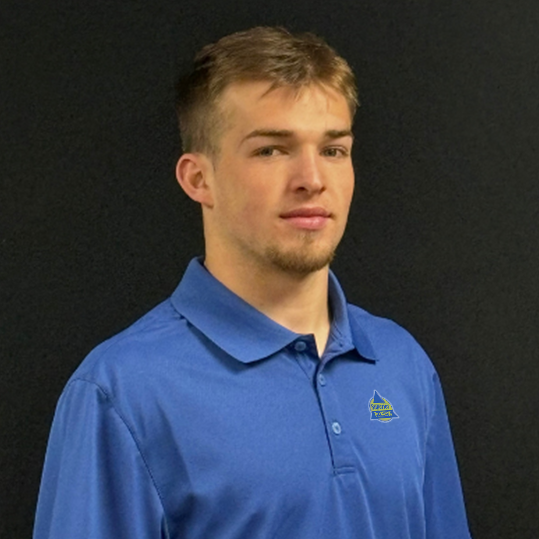 Service Plumber in Blue Collared Shirt