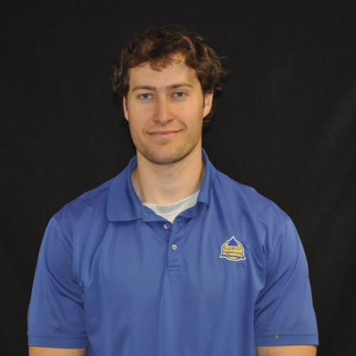 Service Plumber in Blue Collared Shirt
