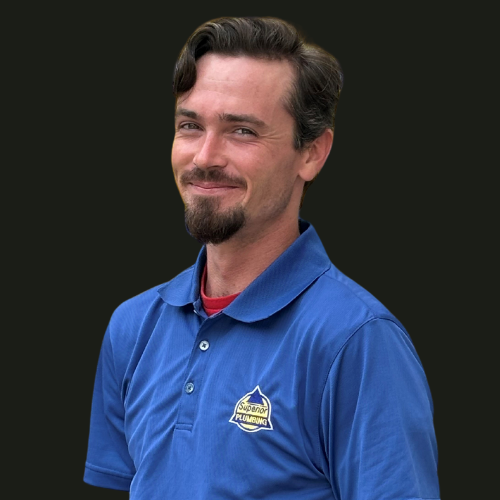Service Plumber in Blue Collared Shirt