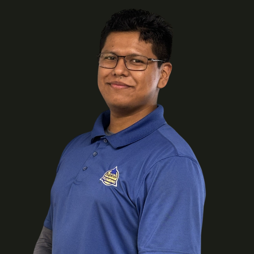 Service Plumber in Blue Collared Shirt