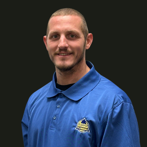 Service Plumber in Blue Collared Shirt