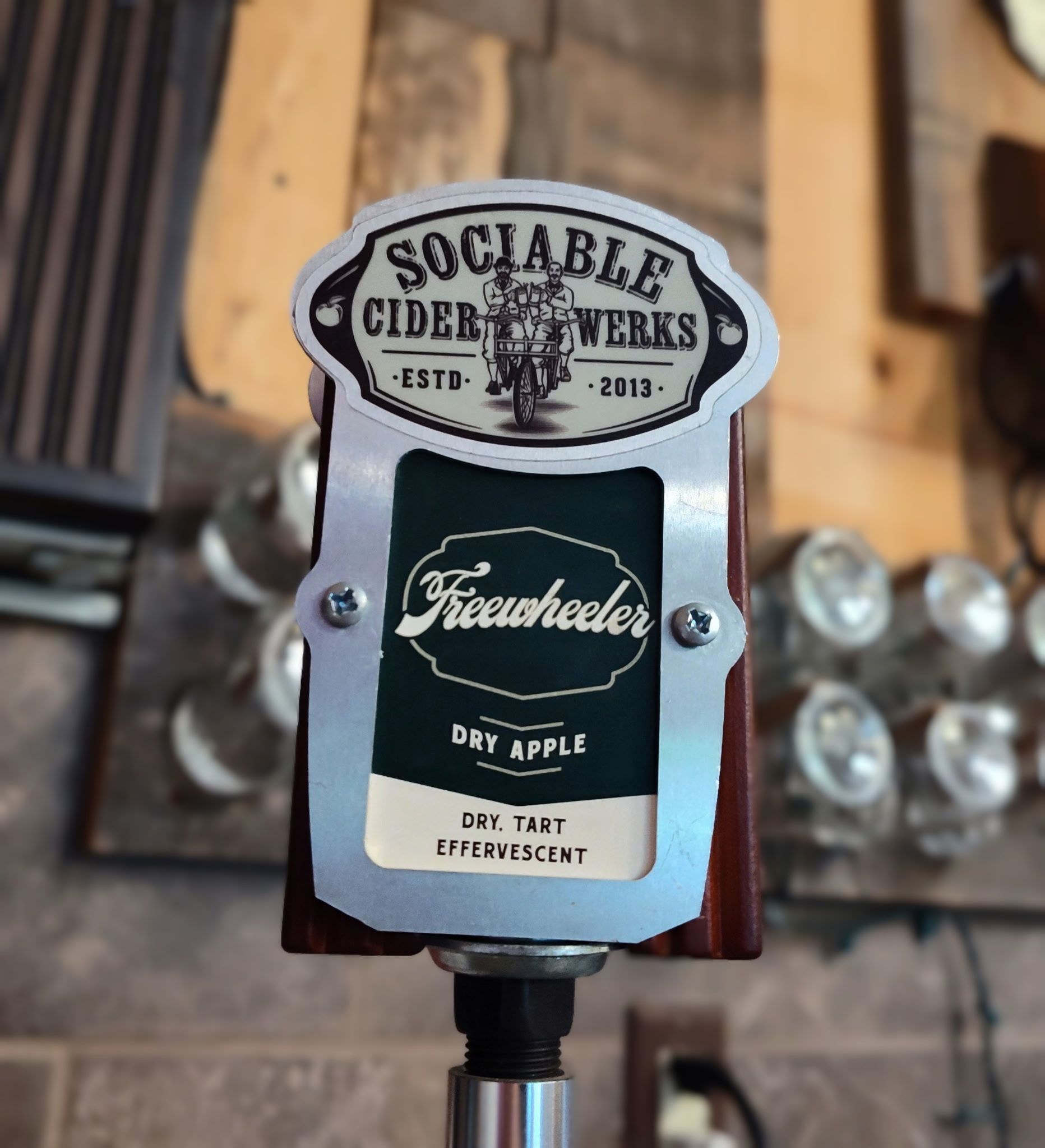 Sociable Cider Werks “Hawkeye” dry apple tap handle with vintage-style label.