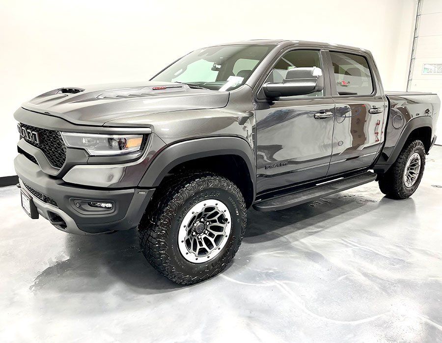 Gray Ram TRX truck parked indoors.