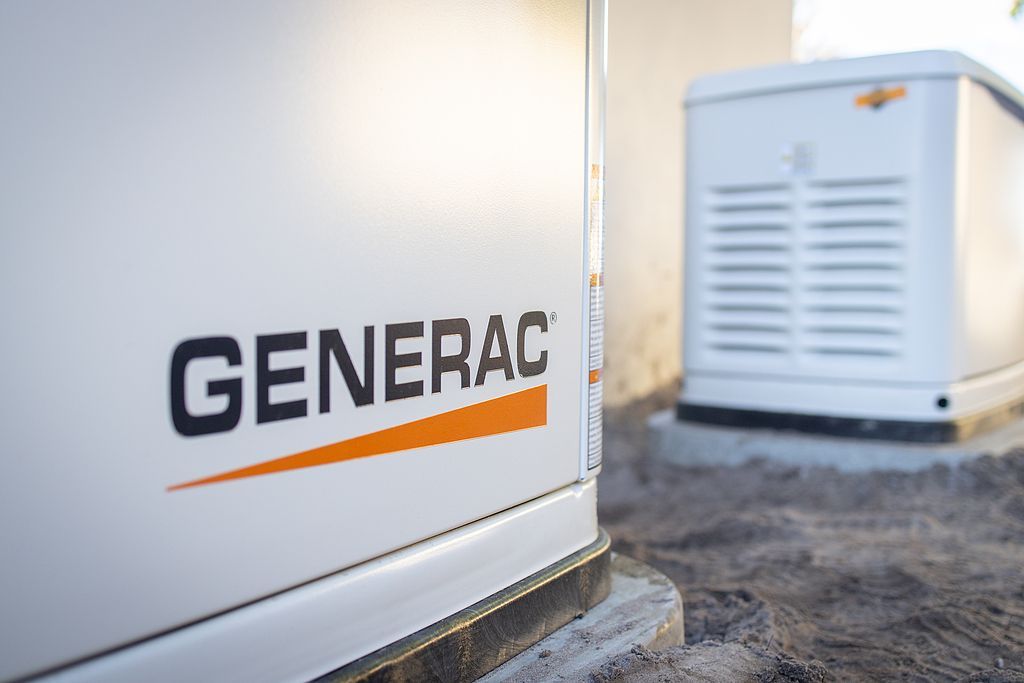 American Electric LLC | A white generator with the word generac on it