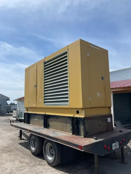 American Electric LLC | A large yellow box is sitting on top of a trailer.