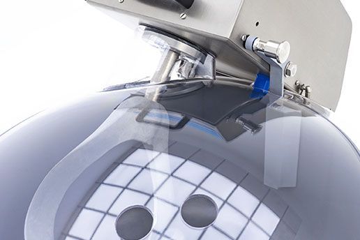 A close up of a machine on a white background.