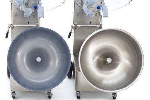Two stainless steel bowls are sitting next to each other on a white surface.
