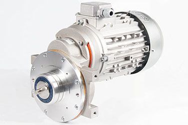A close up of a motor on a white surface.
