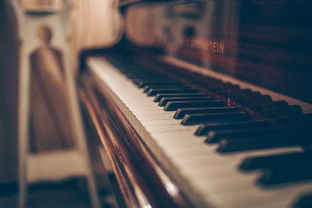 Piano at a memorial service in Long Beach, CA, funeral homes use live or recorded music like this to create a meaningful and comforting tribute for loved ones.