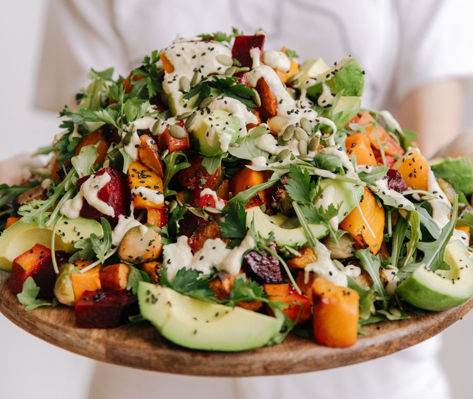 Autumn salad with roast vegetables and miso cashew dressing
