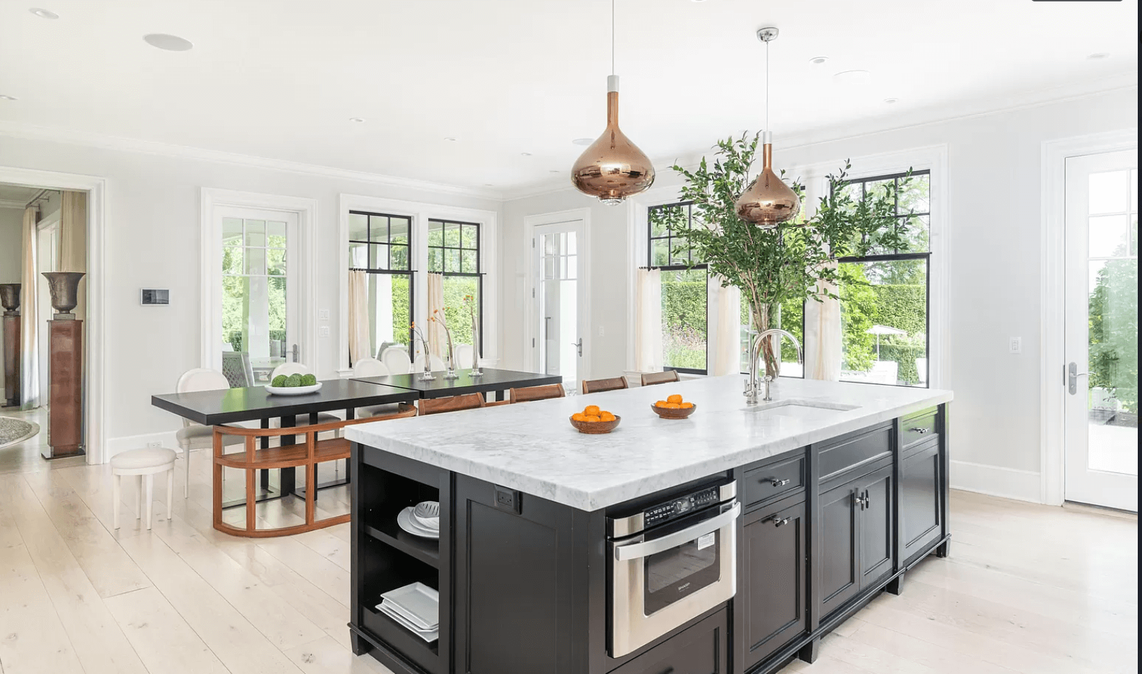 There is a large island in the middle of the kitchen.
