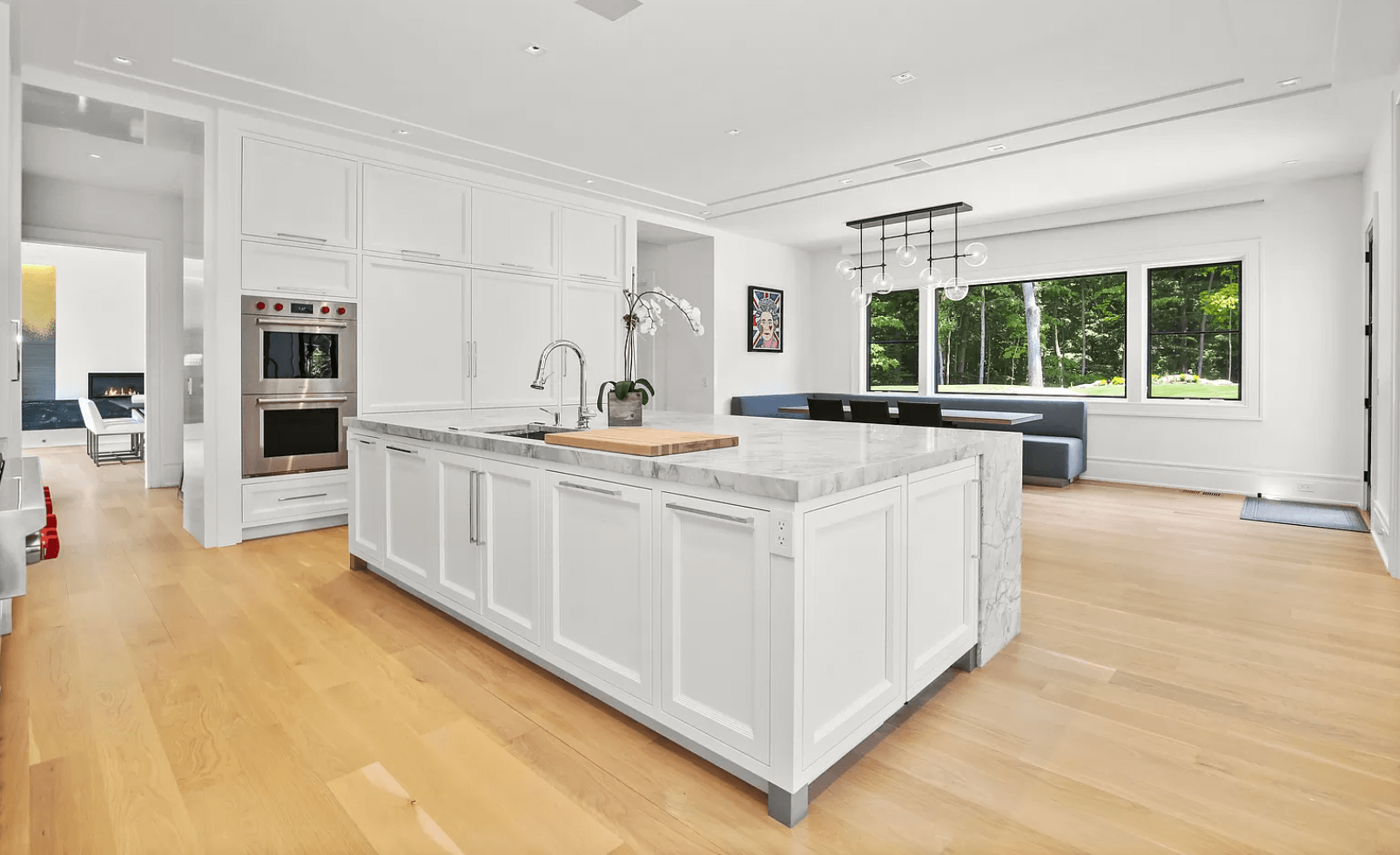 There is a large island in the middle of the kitchen.