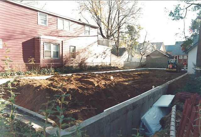 A house with a lot of dirt in front of it