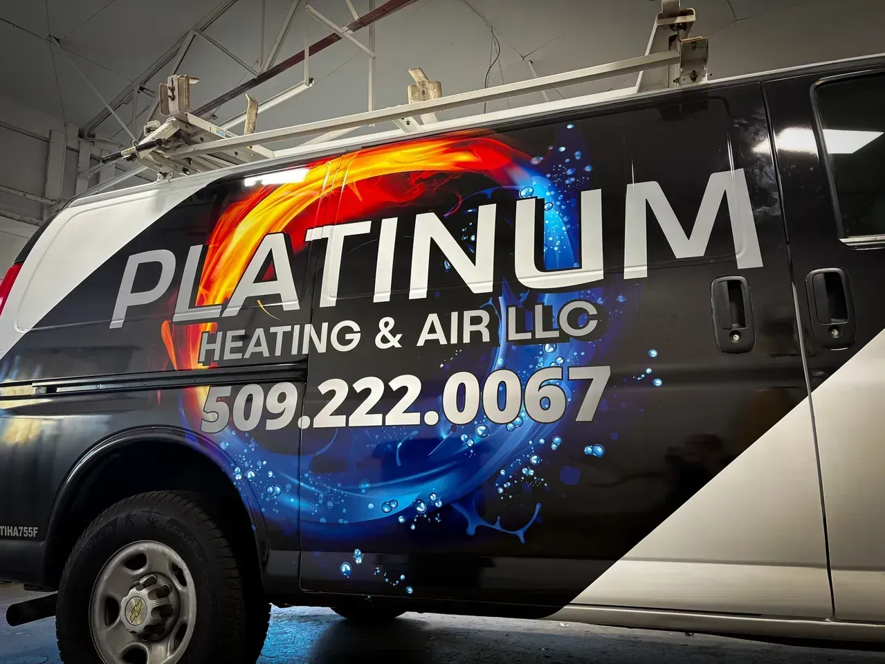 Platinum Heating & Air LLC van graphic with blue and orange logo and phone number 509-222-0067