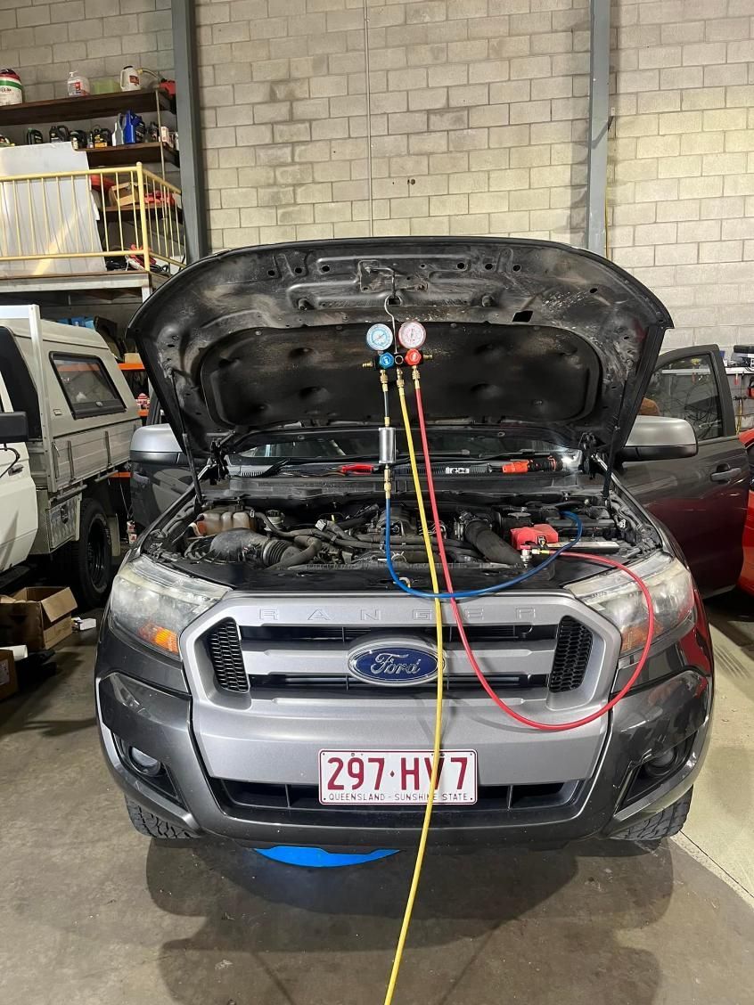 A Ford Truck is Being Serviced in a Garage — BA Auto Electrical In West Mackay, QLD
