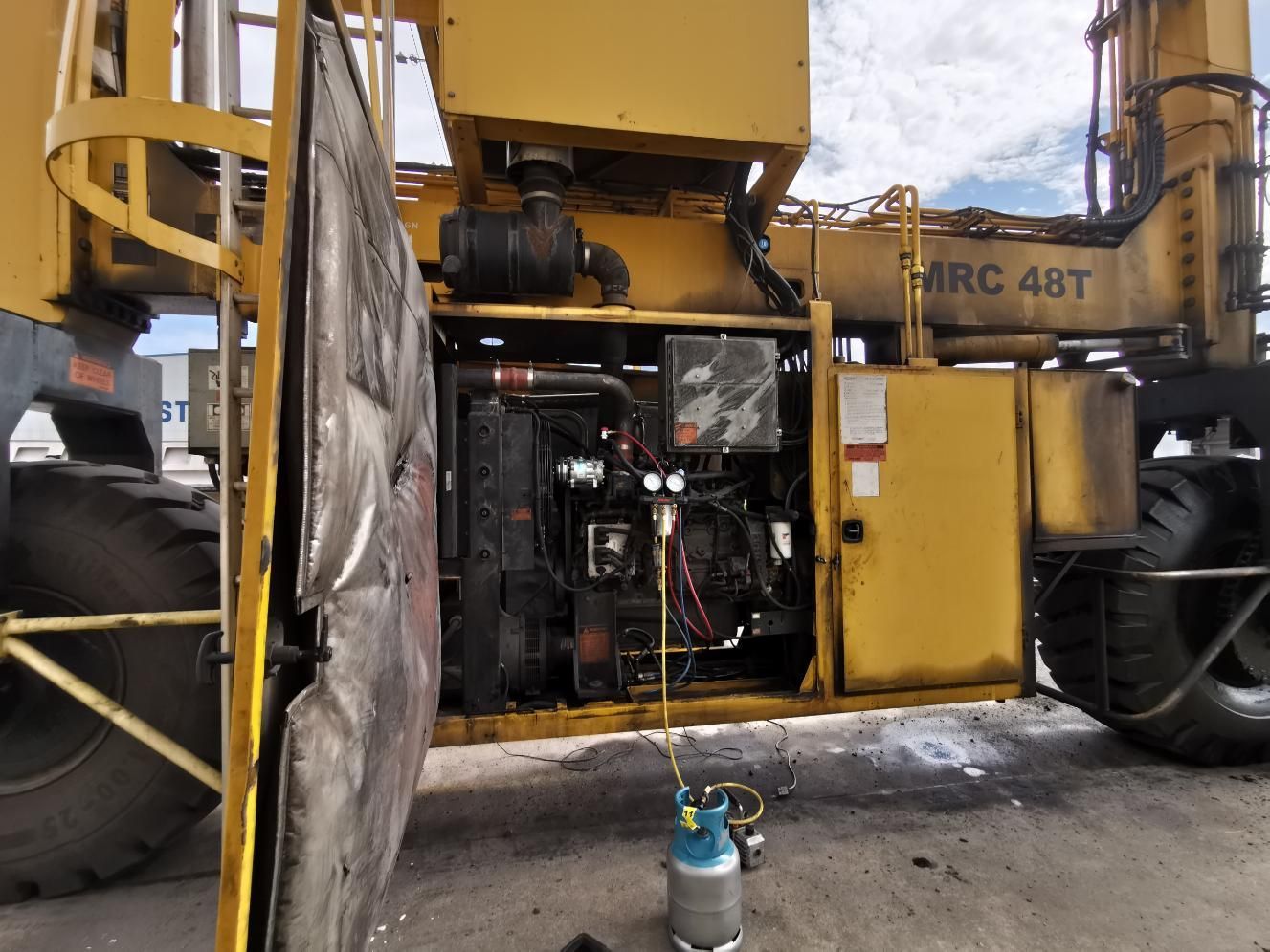 A Yellow Machine With the Word Mrc 48t on It — BA Auto Electrical In West Mackay, QLD