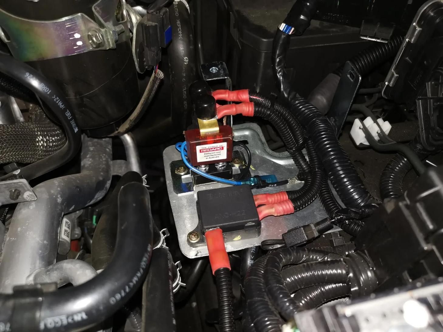 A Close Up of a Car Engine With a Relay on It — BA Auto Electrical In West Mackay, QLD