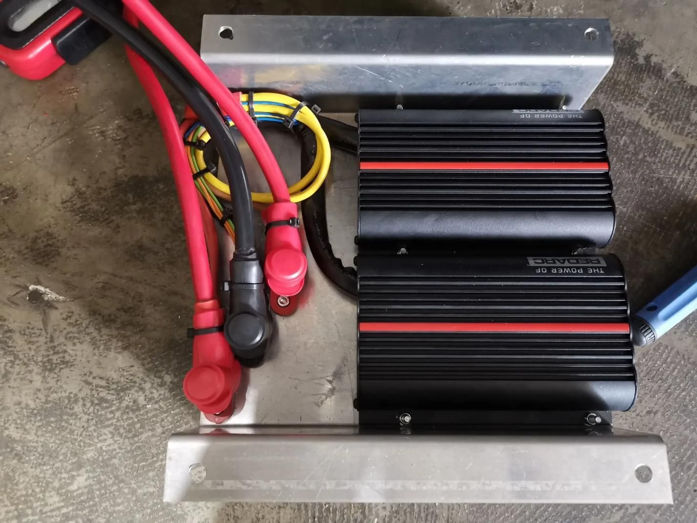 A Black Device With Red and Yellow Wires Attached to It — BA Auto Electrical In West Mackay, QLD