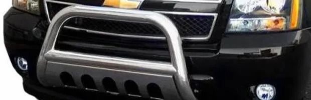 Black Chevrolet SUV front with silver bull bar and grille guard