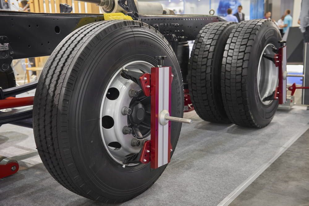 Truck Chassis With Wheels, Alignment Tool Attached — Wheel Alignment Centre in Braitling, NT