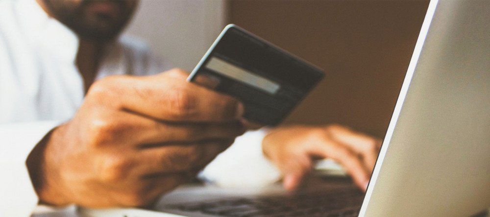 Man holding a credit card