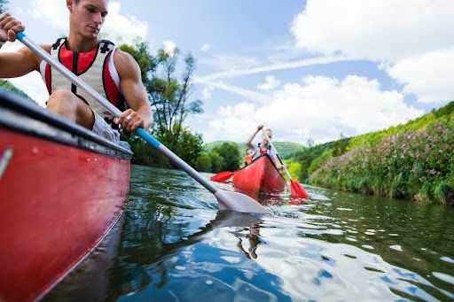 canoe paddling in river