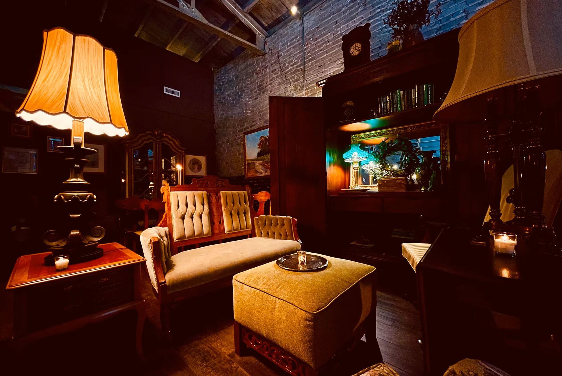 A living room filled with furniture and a lamp.