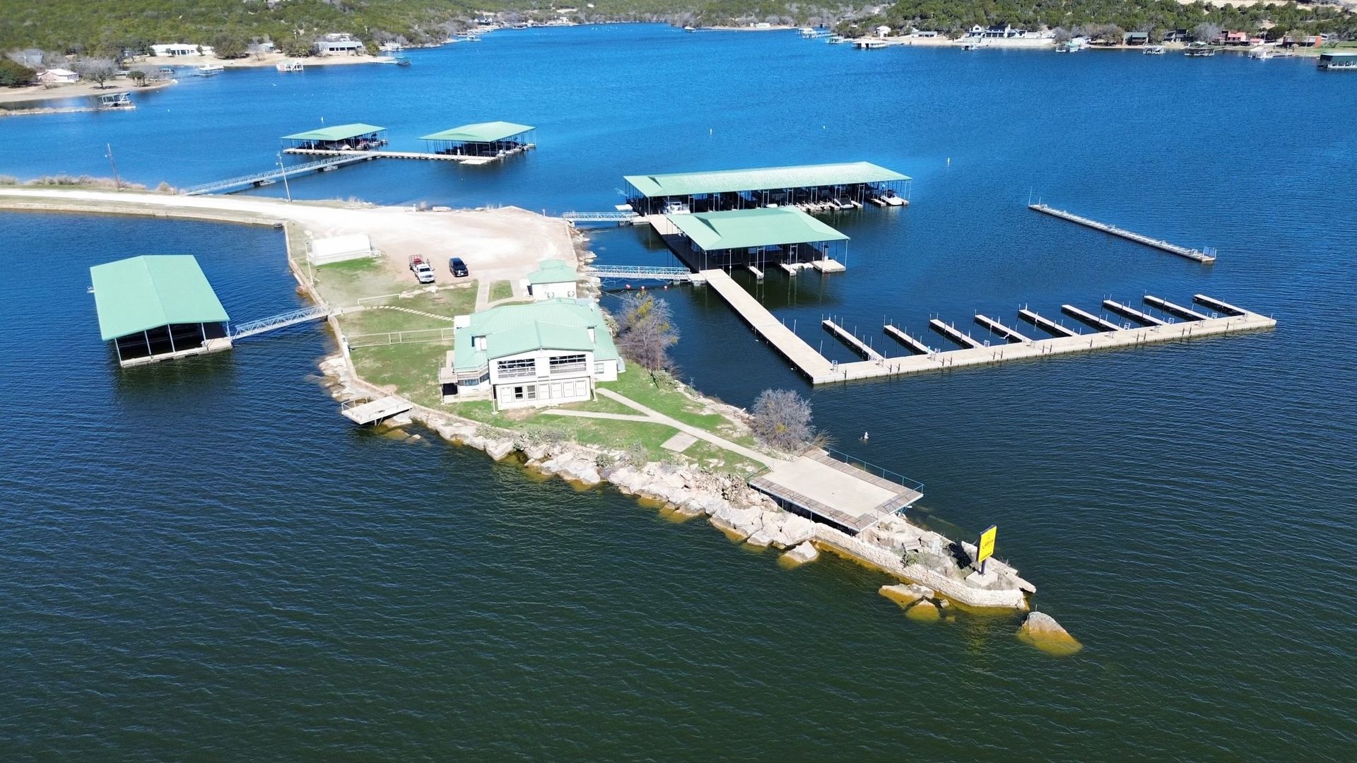 An aerial view of a marina on a lake