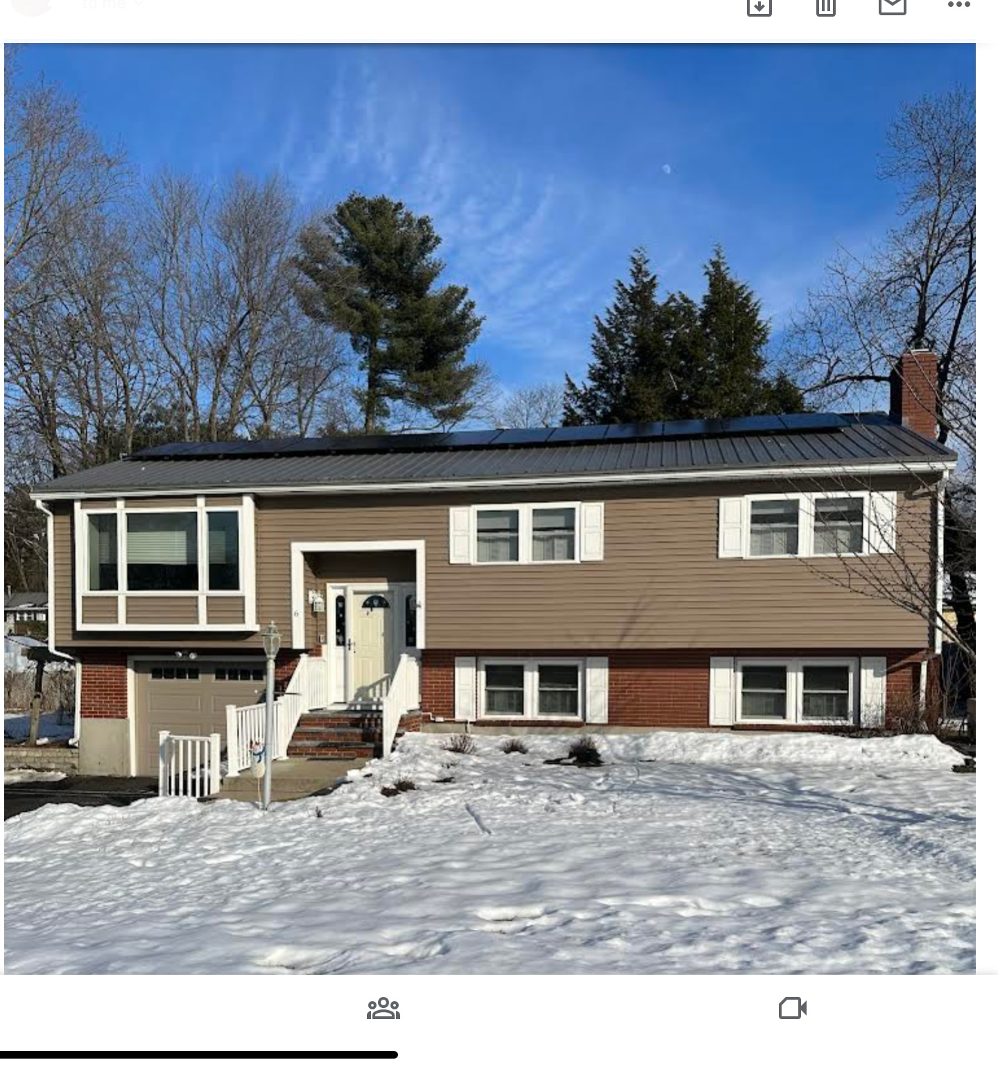 Dracut Solar’s rooftop solar installation on a metal roof in Dracut, MA.