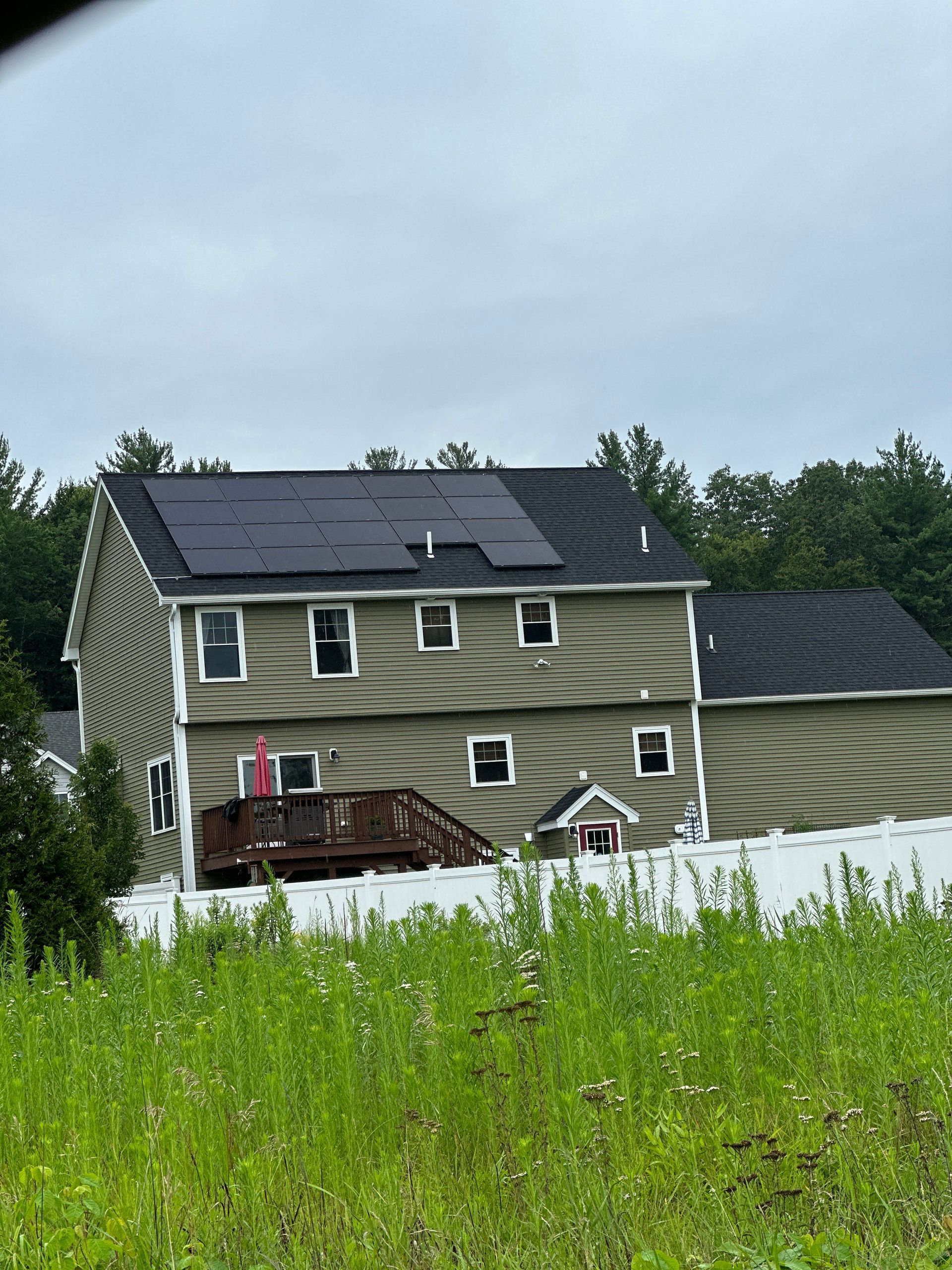 Asphalt shingle rooftop solar installation by Dracut Solar in Dracut, MA.