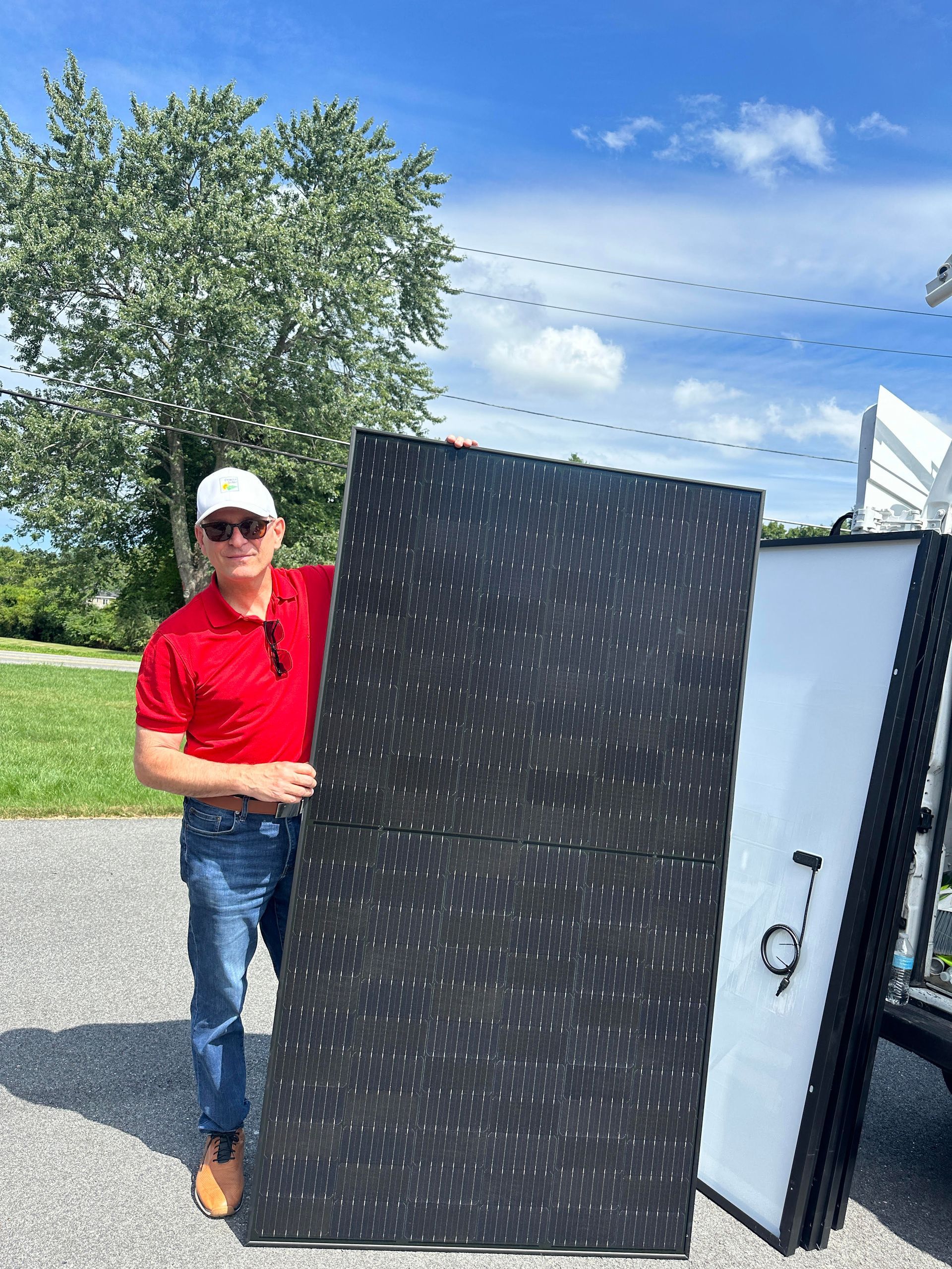 Home with newly installed rooftop solar panels by Dracut Solar in Dracut, MA.