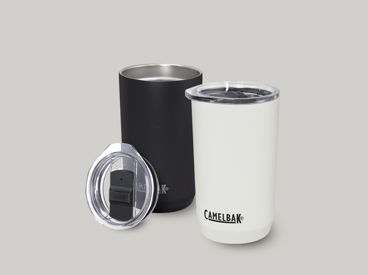 Black insulated tumblers with clear lids, one standing and one lying on its side, with a lid in front.