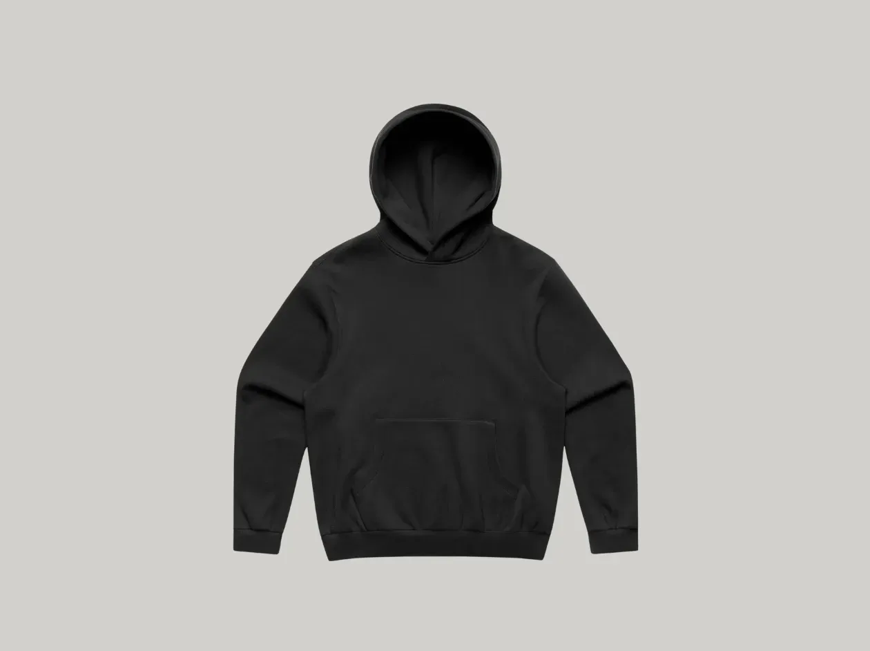 Person wearing a black hoodie and black pants against a light gray background