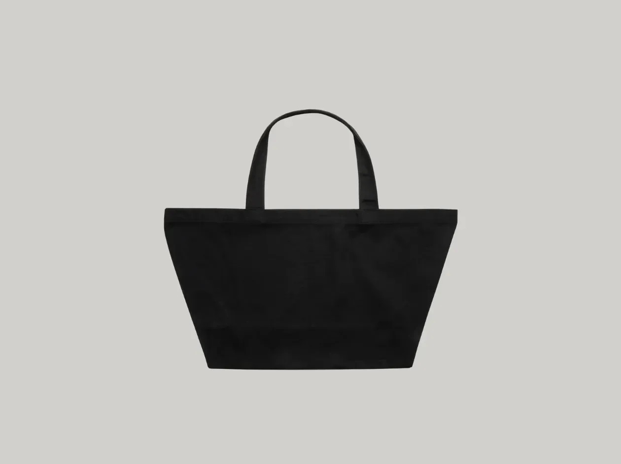 White tote bag with two handles on a light gray background