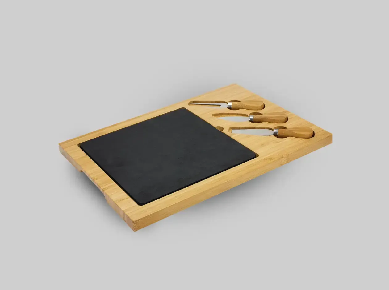 Open black presentation box with wooden insert and black rectangular item inside