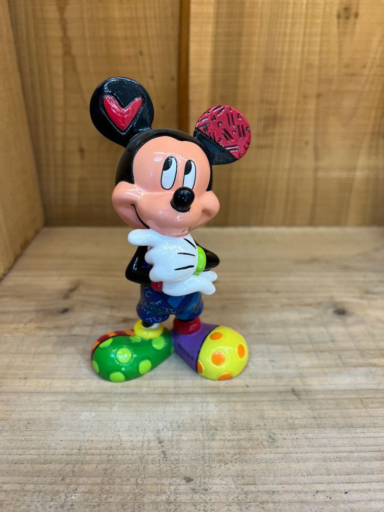 Mickey Mouse, thinking pose.