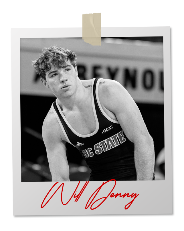 A black and white photo of a wrestler in an 